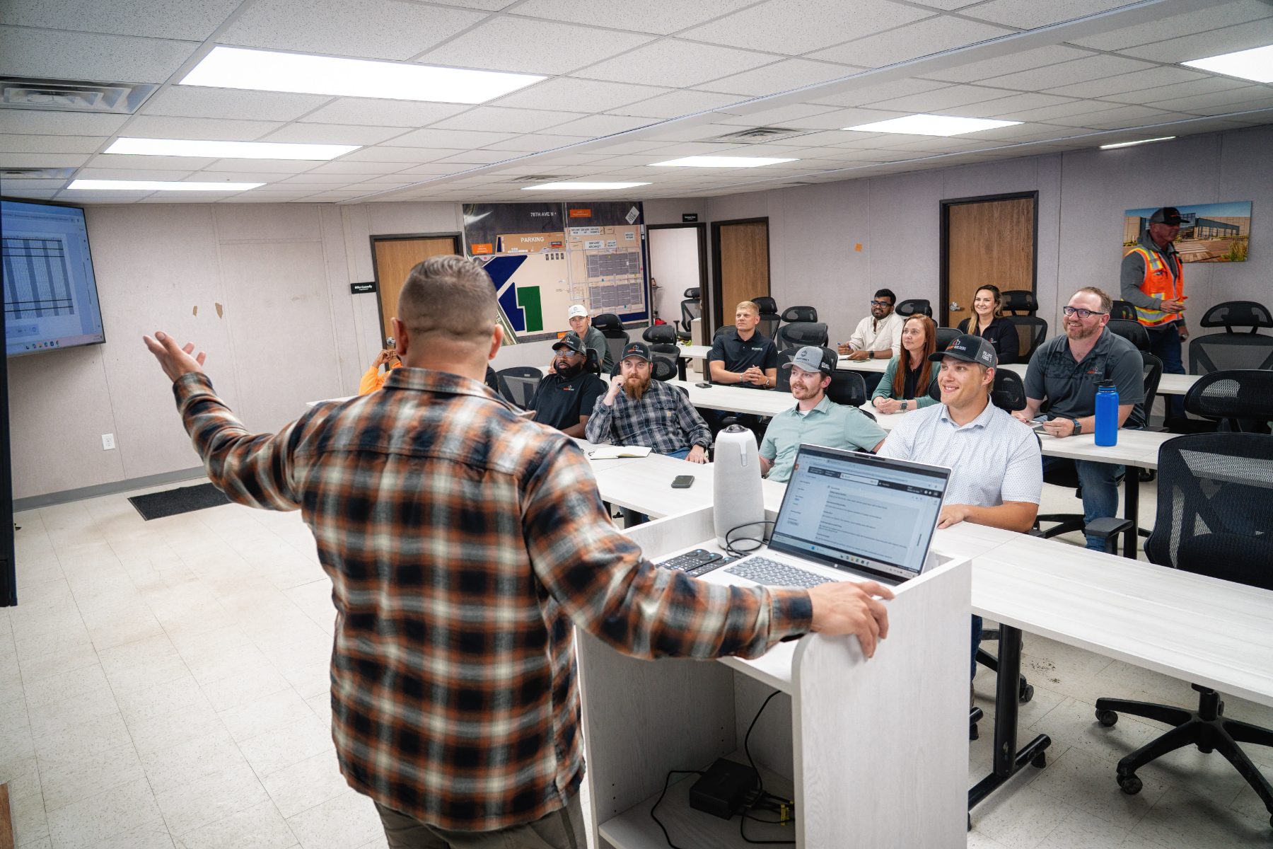 Century team members reviewing plans in a working session